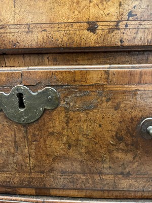 Lot 227 - A George I walnut and feather-banded bachelor's chest