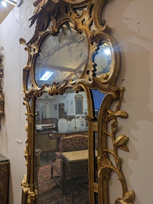Lot 10 - A George III-style giltwood pier mirror in the manner of William and John Linnell