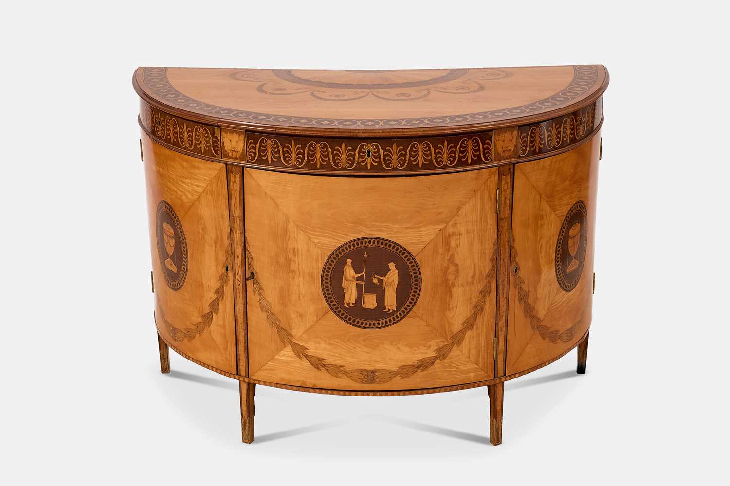 Lot 11 - A George III satinwood, harewood and marquetry commode attributed to Ince & Mayhew