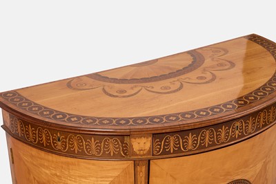 Lot A George III satinwood, harewood and marquetry commode attributed to Ince & Mayhew