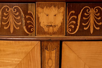 Lot A George III satinwood, harewood and marquetry commode attributed to Ince & Mayhew