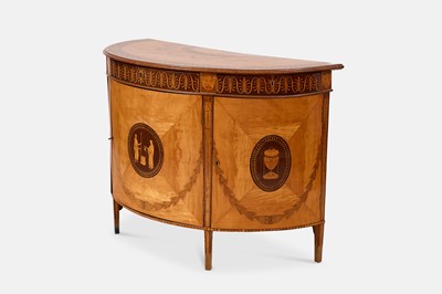 Lot A George III satinwood, harewood and marquetry commode attributed to Ince & Mayhew