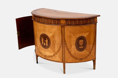 Lot A George III satinwood, harewood and marquetry commode attributed to Ince & Mayhew