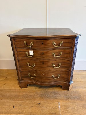 Lot 3 - A George III mahogany serpentine chest of drawers