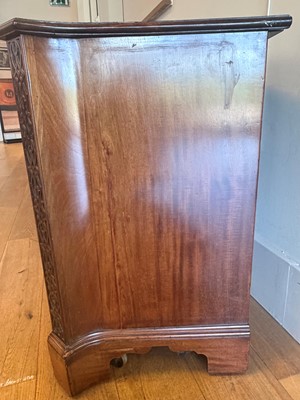 Lot 3 - A George III mahogany serpentine chest of drawers
