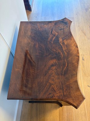 Lot 3 - A George III mahogany serpentine chest of drawers