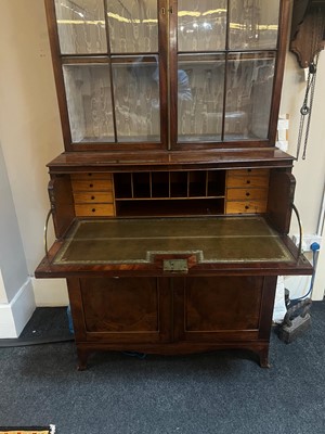 Lot 13 - A George III mahogany secretaire bookcase