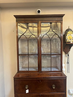Lot 13 - A George III mahogany secretaire bookcase