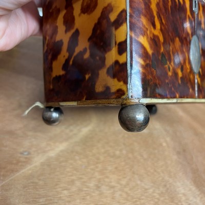 Lot 1 - A George III tortoiseshell, silver and ivory tea caddy