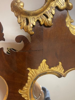 Lot 20 - A George II walnut and parcel-gilt mirror