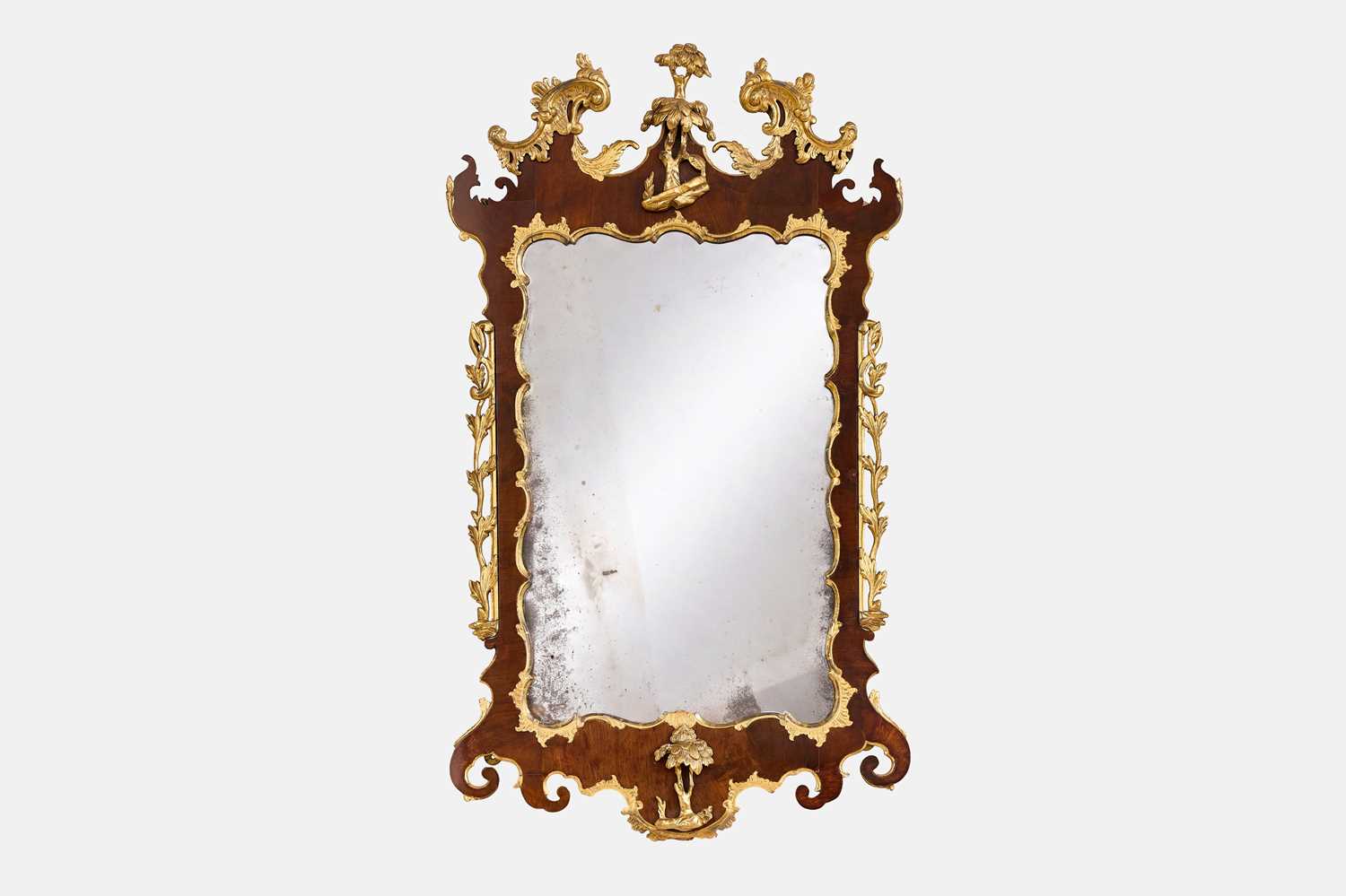 Lot 20 - A George II walnut and parcel-gilt mirror