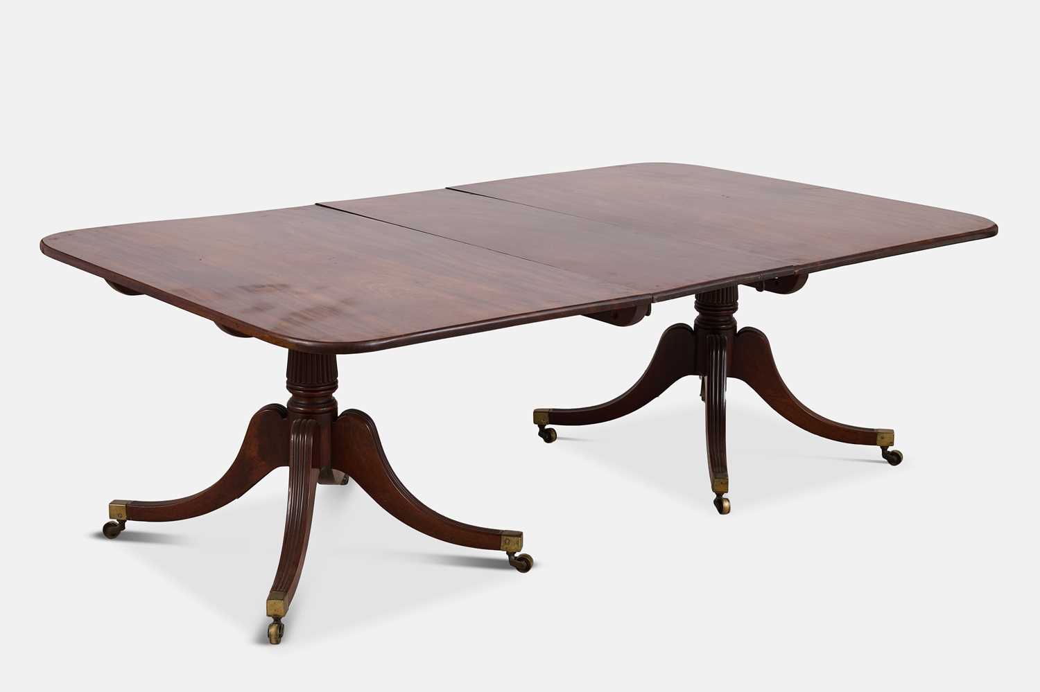 Lot 15 - A Regency mahogany twin-pedestal dining table