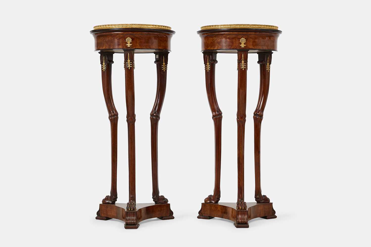 Lot 44 - A pair of mahogany, porphyry and ormolu torchères