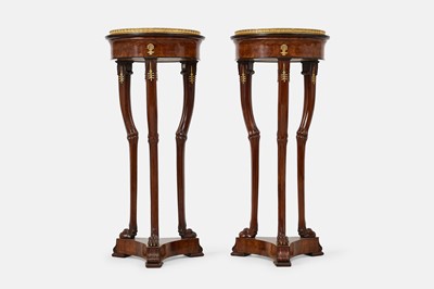 Lot 44 - A pair of mahogany, porphyry and ormolu torchères