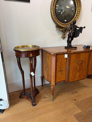 Lot 44 - A pair of mahogany, porphyry and ormolu torchères