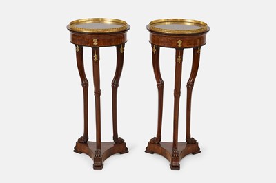 Lot 44 - A pair of mahogany, porphyry and ormolu torchères