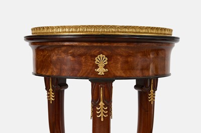 Lot 44 - A pair of mahogany, porphyry and ormolu torchères