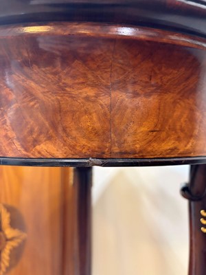 Lot 44 - A pair of mahogany, porphyry and ormolu torchères