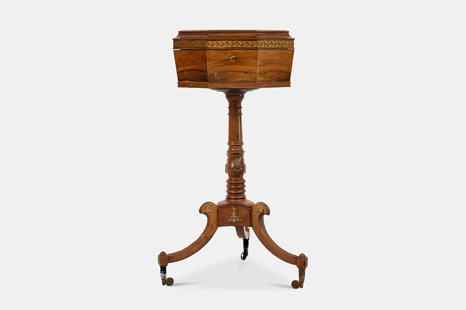 Lot 24 - A Regency rosewood and brass teapoy