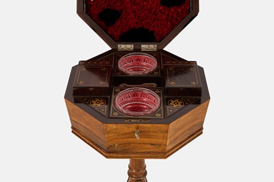 Lot 24 - A Regency rosewood and brass teapoy