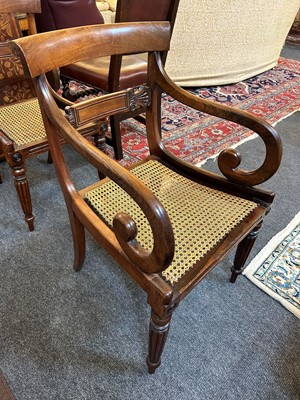 Lot 14 - A set of eight George IV mahogany dining chairs