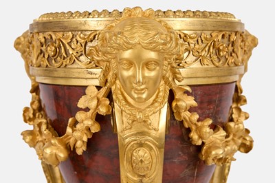 Lot 6 - A Régence-style ormolu and griotte marble jardinière