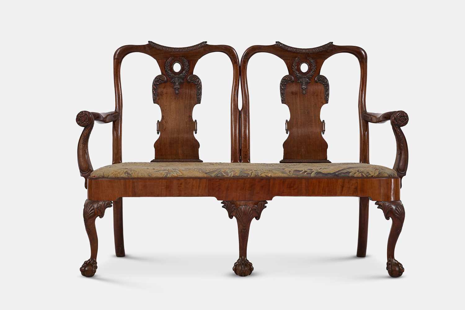 Lot 22 - A George II mahogany chair-back settee