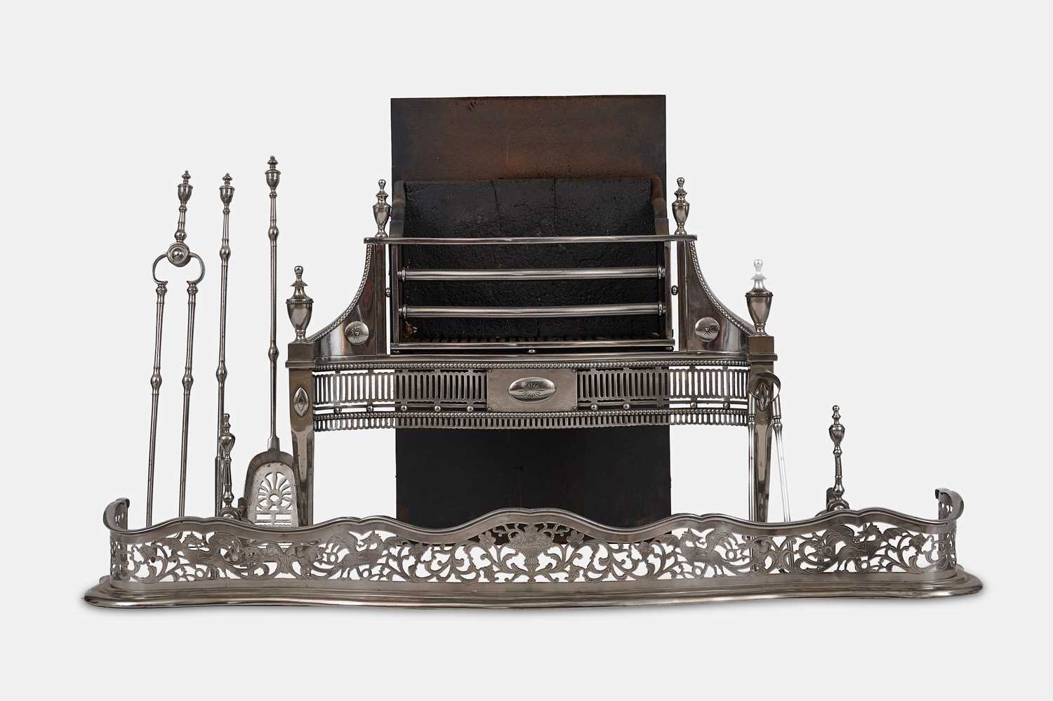 Lot 51 - A George III polished steel and iron fire set