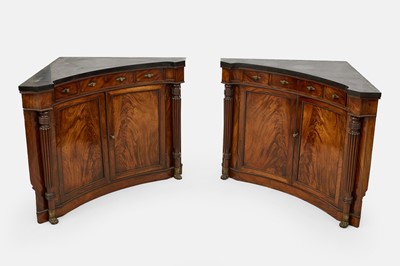 Lot 30 - A pair of Regency mahogany corner cabinets