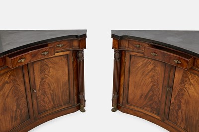 Lot 30 - A pair of Regency mahogany corner cabinets