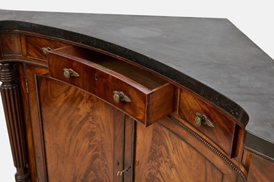 Lot 30 - A pair of Regency mahogany corner cabinets