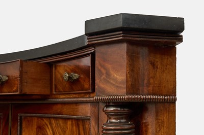 Lot 30 - A pair of Regency mahogany corner cabinets