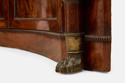 Lot 30 - A pair of Regency mahogany corner cabinets