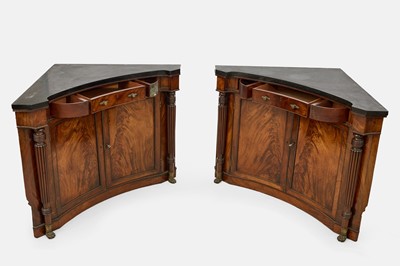 Lot 30 - A pair of Regency mahogany corner cabinets
