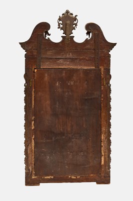 Lot 4 - A George II giltwood and gesso mirror in the manner of William Kent