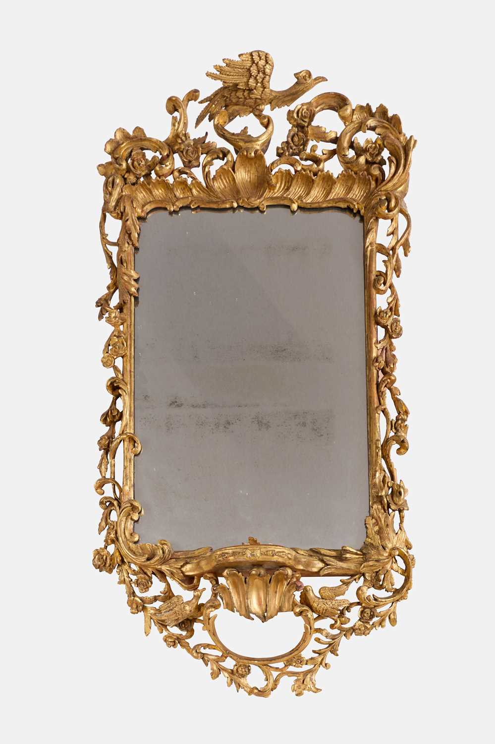 Lot 43 - A carved giltwood mirror in the manner of Thomas Johnson