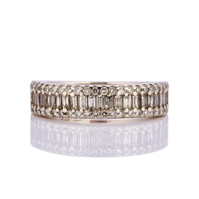 Lot 62 - A 14ct gold three row diamond half eternity ring