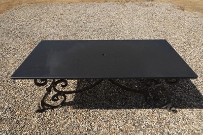Lot 422 - A wrought-iron-framed garden table