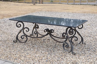 Lot 422 - A wrought-iron-framed garden table