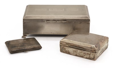 Lot 19 - A silver cigarette case and two other similar