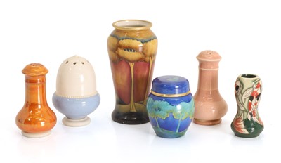 Lot 101 - A small Moorcroft tree pattern vase