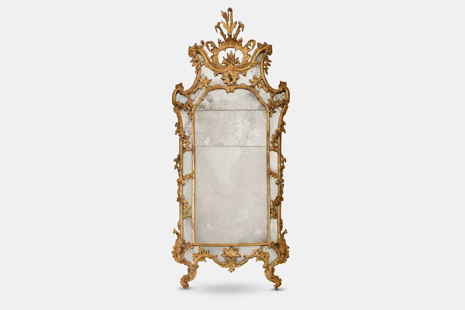 Lot 101 - A rococo carved giltwood pier mirror