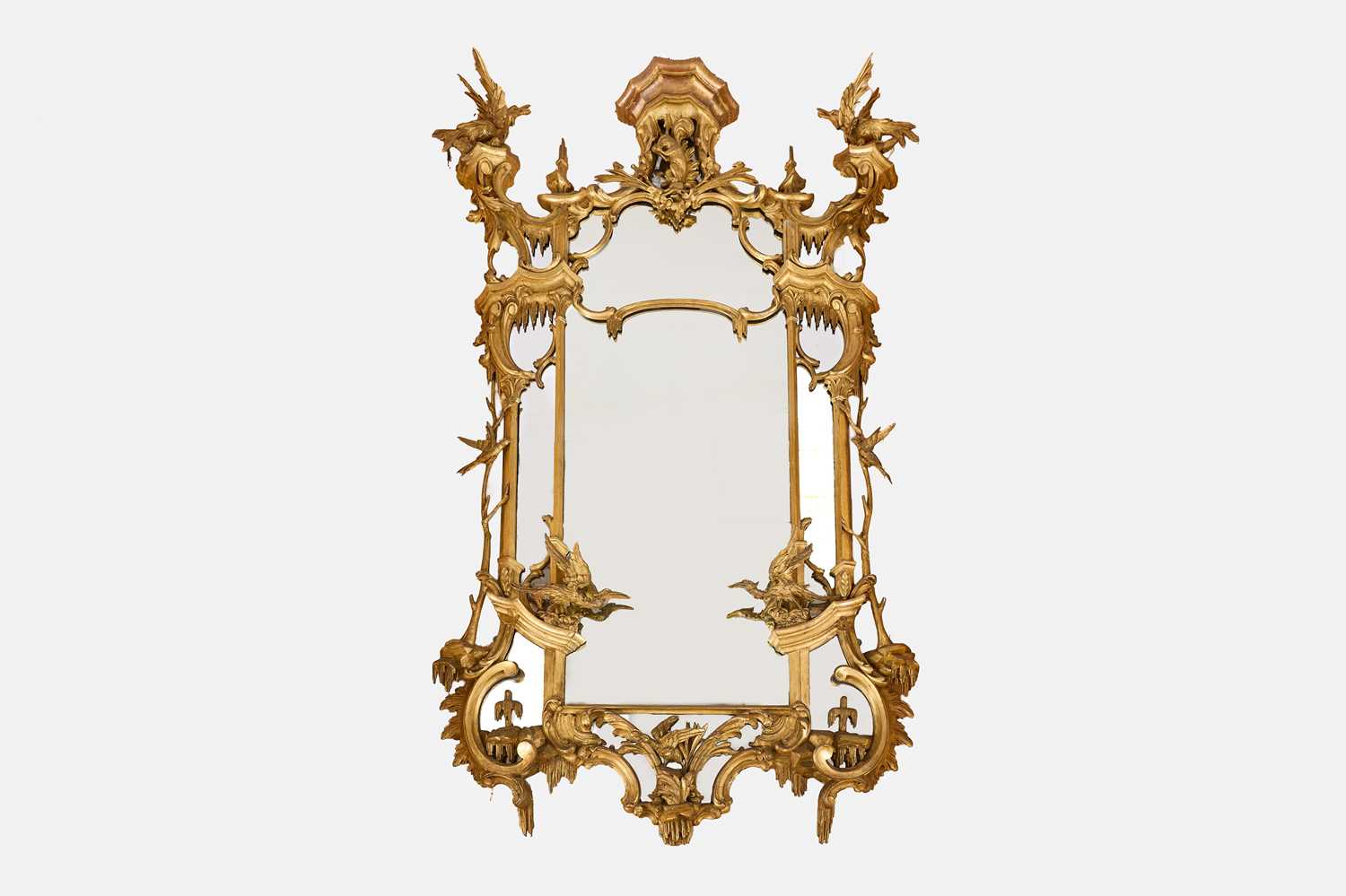 Lot 106 - A George III-style carved giltwood pier mirror