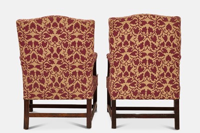 Lot 90 - A pair of George III mahogany Gainsborough library armchairs