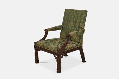Lot 294 - A George III-style mahogany Gainsborough library armchair