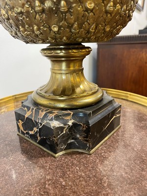 Lot 88 - A pair of neoclassical gilt-bronze urns