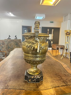 Lot 88 - A pair of neoclassical gilt-bronze urns