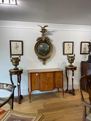 Lot 88 - A pair of neoclassical gilt-bronze urns