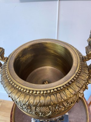 Lot 88 - A pair of neoclassical gilt-bronze urns