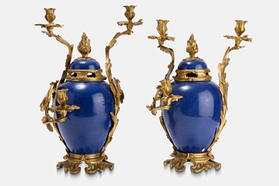 Lot 350 - A pair of Louis XV-style cobalt-blue porcelain and ormolu candelabra